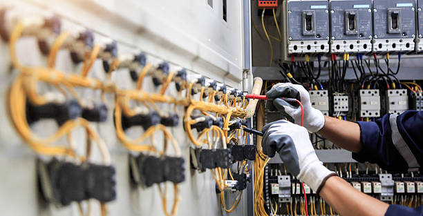 Professional Electrician technician working in Four Oaks, NC